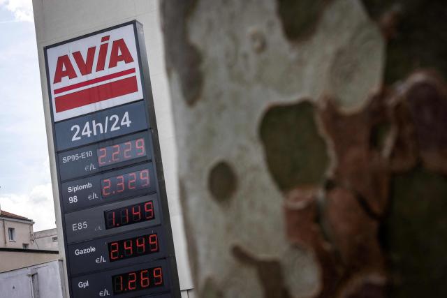 This photograph shows fuel prices displayed on a totem at an Avia petrol station in Charenton-le-Pont, southeast of Paris on April 16, 2026. US-Israel war on Iran, launched on February 28, has roiled global energy and equities markets, sending oil prices skyrocketing after Tehran virtually closed the key Strait of Hormuz. (Photo by Behrouz MEHRI / AFP)