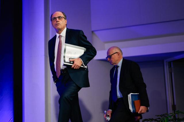 Jihad Azour (L), Director of the IMF Middle East and Central Asia Department and former Finance Minister of Lebanon,  arrives to speak during a press briefing on the regional economic outlook for the Middle East and Central Asia, during the 2026 IMF and World Bank Group Spring Meetings in Washington, DC, on April 16, 2026. (Photo by Kent Nishimura / AFP)