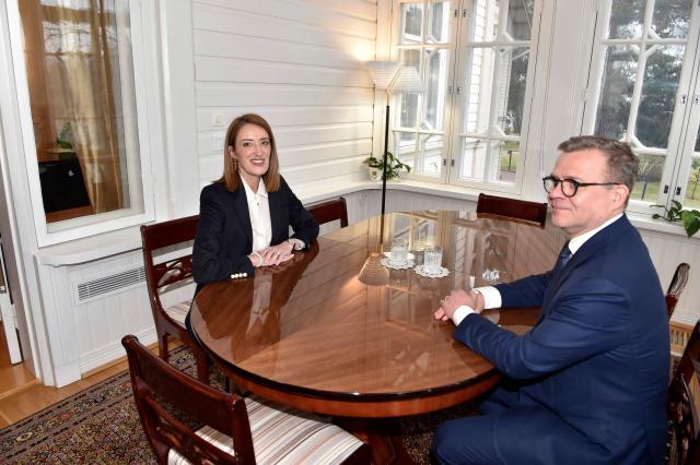 Finnish Prime Minister Petteri Orpo (R) and president of the European Parliament Roberta Metsola meet at the Prime Minister's official residence Kesaeranta in Helsinki, Finland, on April 16, 2026. (Photo by Kimmo Penttinen / Lehtikuva / AFP) / Finland OUT