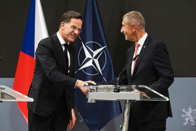 CORRECTION / Czech Republic's Prime Minister Andrej Babis (R) and NATO Secretary General Mark Rutte shake hands during a joint press conference after talks in Prague, on April 16, 2026. (Photo by Michal Cizek / AFP) / “The erroneous mention[s] appearing in the metadata of this photo by Michal Cizek has been modified in AFP systems in the following manner: [Czech Republic's Prime Minister Andrej Babis ] instead of [Czech Republic's President Andrej Babis]. Please immediately remove the erroneous mention[s] from all your online services and delete it (them) from your servers. If you have been authorized by AFP to distribute it (them) to third parties, please ensure that the same actions are carried out by them. Failure to promptly comply with these instructions will entail liability on your part for any continued or post notification usage. Therefore we thank you very much for all your attention and prompt action. We are sorry for the inconvenience this notification may cause and remain at your disposal for any further information you may require.”