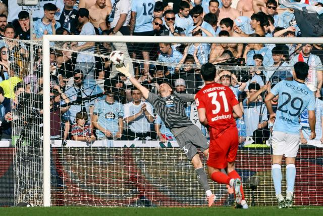 Freiburg's German forward #31 Igor Matanovic scores the opening goal during the UEFA Europa League quarter final second leg football match between RC Celta de Vigo and SC Freiburg at Balaidos Stadium in Vigo on April 16, 2026. (Photo by Miguel RIOPA / AFP)