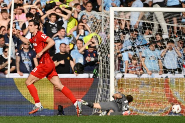 Freiburg's German forward #31 Igor Matanovic celebrates scoring the opening goal during the UEFA Europa League quarter final second leg football match between RC Celta de Vigo and SC Freiburg at Balaidos Stadium in Vigo on April 16, 2026. (Photo by Miguel RIOPA / AFP)