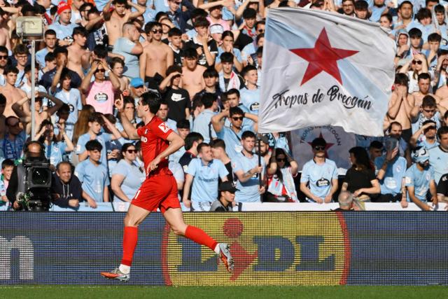 Freiburg's German forward #31 Igor Matanovic celebrates scoring the opening goal during the UEFA Europa League quarter final second leg football match between RC Celta de Vigo and SC Freiburg at Balaidos Stadium in Vigo on April 16, 2026. (Photo by Miguel RIOPA / AFP)