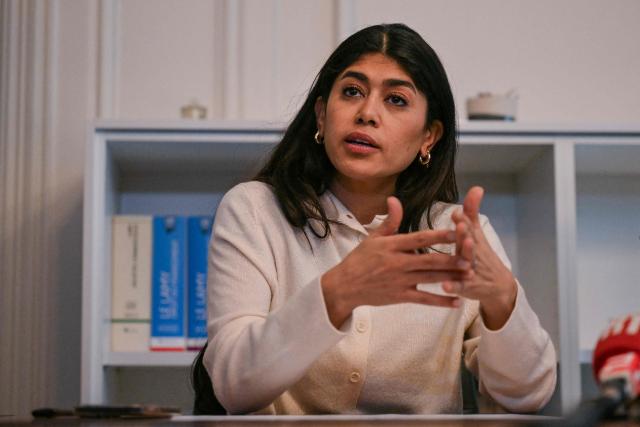 (FILES) French-Palestinian member of the European Parliament Rima Hassan speaks during a press conference along with her lawyer following a hearing at the regional headquarters of the judiciary police in Paris on April 3, 2026. Two weeks after leaks appeared in the press whilst she was in police custody – including a report, later denied, that she was in possession of drugs – LFI's MEP Rima Hassan has lodged a complaint with the Human Rights Defender, accusing police officers of "misconduct". (Photo by Blanca CRUZ / AFP)