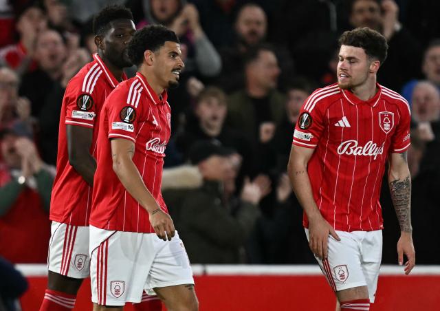 Nottingham Forest's English midfielder #10 Morgan Gibbs-White (C) celebrates scoring the opening goal during the UEFA Europa League quarter final second-leg football match between Nottingham Forest and FC Porto at The City Ground in Nottingham, central England, on April 16, 2026. (Photo by Paul ELLIS / AFP)