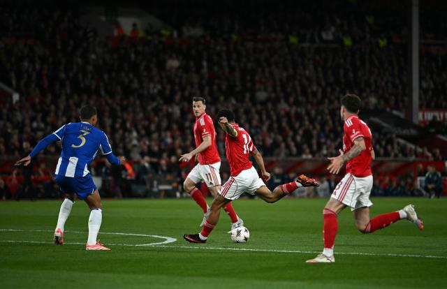 Nottingham Forest's English midfielder #10 Morgan Gibbs-White (C) scores the opening goal during the UEFA Europa League quarter final second-leg football match between Nottingham Forest and FC Porto at The City Ground in Nottingham, central England, on April 16, 2026. (Photo by Paul ELLIS / AFP)