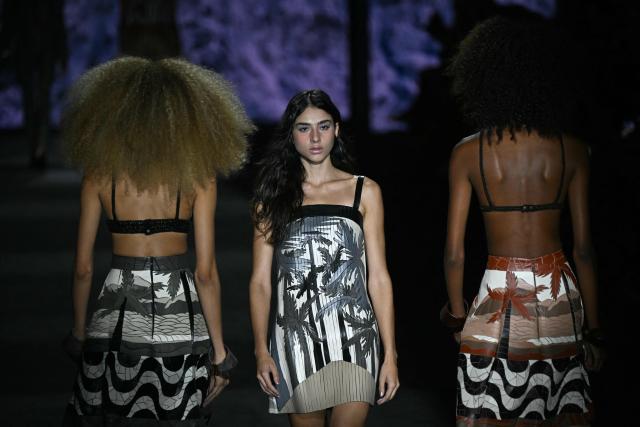Models present creations by Patricia Vieira during the Rio Fashion Week at Pier Maua in Rio de Janeiro, Brazil, on April 16, 2026. (Photo by Mauro PIMENTEL / AFP)