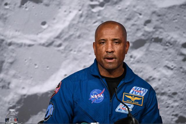 NASA's Artemis II mission astronaut Victor Glover speaks during a press conference at Johnson Space Center in Houston, Texas, on April 16, 2026. The astronauts did the first slingshot around the Moon in more than 50 years and traveled deeper into space than any humans before, culminating in a smooth splashdown on April 10 off the coast of California. (Photo by RONALDO SCHEMIDT / AFP)