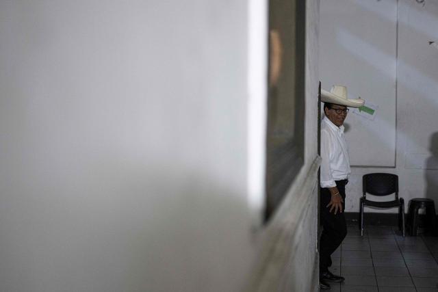 Peru's presidential candidate for the Juntos por el Peru party, Roberto Sanchez, arrives to deliver a press conference at his campaign office in Lima on April 16, 2026. On April 16, Peru's right-wing presidential hopeful Rafael Lopez Aliaga offered a $5,800 reward to any election official who produced proof of his claim that the April 12 election was fraudulent. (Photo by Ernesto BENAVIDES / AFP)