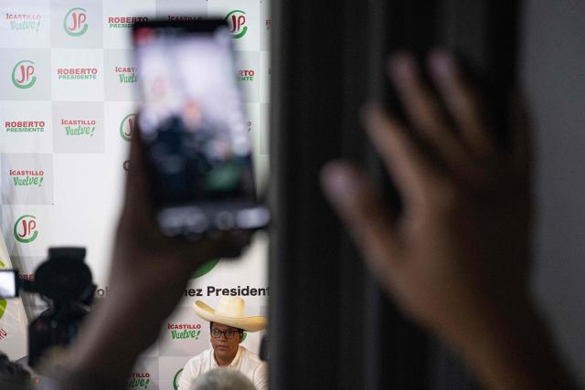 Peru's presidential candidate for the Juntos por el Peru party, Roberto Sanchez, delivers a press conference at his campaign office in Lima on April 16, 2026. On April 16, Peru's right-wing presidential hopeful Rafael Lopez Aliaga offered a $5,800 reward to any election official who produced proof of his claim that the April 12 election was fraudulent. (Photo by Ernesto BENAVIDES / AFP)