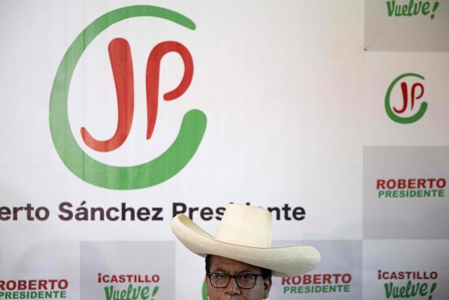Peru's presidential candidate for the Juntos por el Peru party, Roberto Sanchez, delivers a press conference at his campaign office in Lima on April 16, 2026. On April 16, Peru's right-wing presidential hopeful Rafael Lopez Aliaga offered a $5,800 reward to any election official who produced proof of his claim that the April 12 election was fraudulent. (Photo by Ernesto BENAVIDES / AFP)