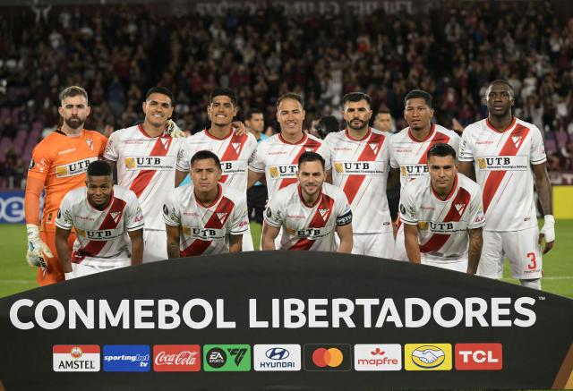 Players of Always Ready pose for a picture ahead of the Copa Libertadores group stage football match between Argentina's Lanus and Bolivia's Always Ready at the Ciudad de Lanus stadium in Lanus, Buenos Aires province, Argentina, on April 16, 2026. (Photo by JUAN MABROMATA / AFP)