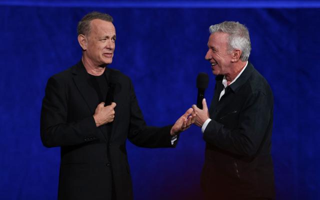 US actor Tom Hanks (L) and US actor Tim Allen (R) promote "Toy Story 5" during the Walt Disney Studios presentation at CinemaCon at The Colosseum at Caesars Palace on April 16, 2026 in Las Vegas, Nevada. (Photo by VALERIE MACON / AFP)