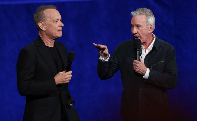 US actor Tom Hanks (L) and US actor Tim Allen (R) promote "Toy Story 5" during the Walt Disney Studios presentation at CinemaCon at The Colosseum at Caesars Palace on April 16, 2026 in Las Vegas, Nevada. (Photo by VALERIE MACON / AFP)