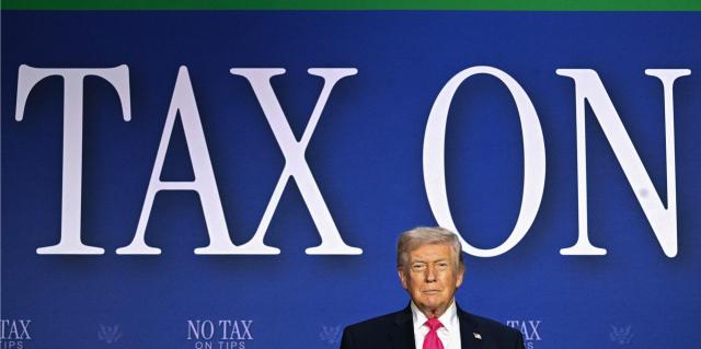 US President Donald Trump arrives for a roundtable discussion on his "no tax on tips" policy at the AC Hotel Las Vegas Symphony Park in Las Vegas, Nevada, on April 16, 2026. (Photo by Jim WATSON / AFP)