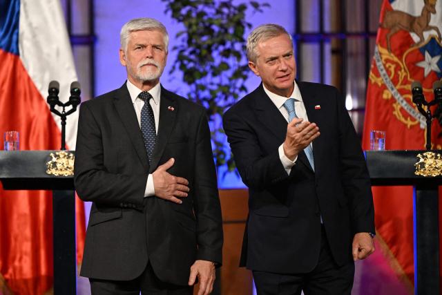 Chile's President Jose Antonio Kast (R) gestures next to Czech President Petr Pavel during a joint press conference at La Moneda Presidential Palace in Santiago on April 16, 2026. (Photo by RODRIGO ARANGUA / AFP)