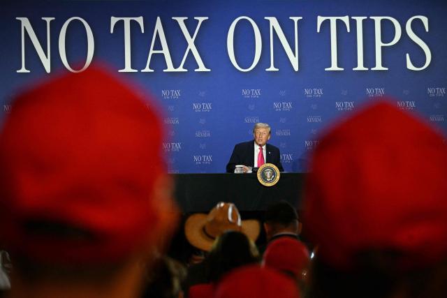 US President Donald Trump speaks during a roundtable discussion on his "no tax on tips" policy at the AC Hotel Las Vegas Symphony Park in Las Vegas, Nevada, on April 16, 2026. (Photo by Jim WATSON / AFP)