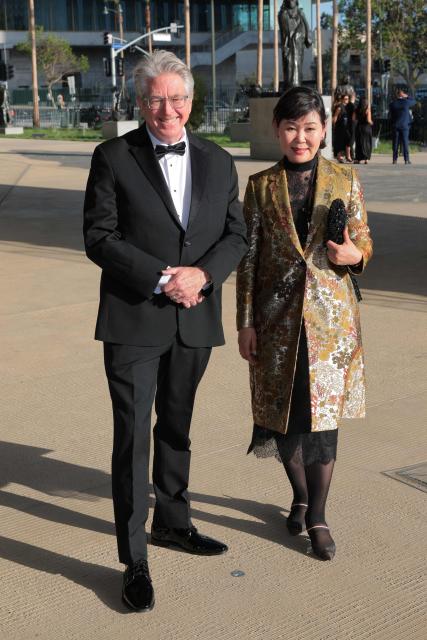 Stephen Little (L) and guest attend the Los Angeles County Museum of Art's (LACMA) opening gala for the David Geffen Galleries at LACMA in Los Angeles, on April 16, 2026. (Photo by Etienne LAURENT / AFP)