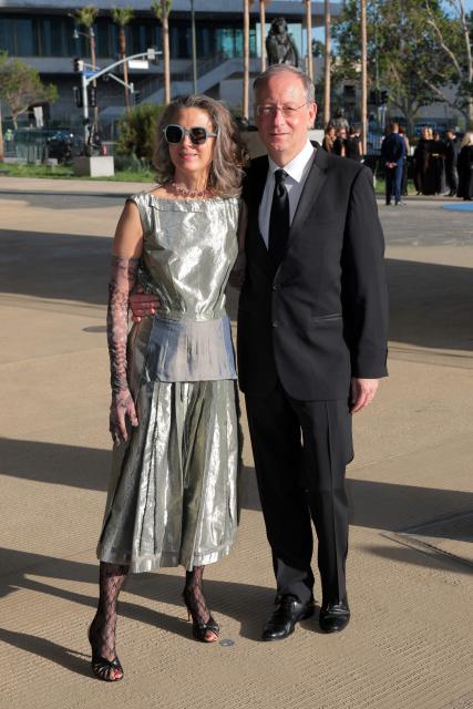 Swiss art curator Christophe Cherix (R) and guest attend the Los Angeles County Museum of Art's (LACMA) opening gala for the David Geffen Galleries at LACMA in Los Angeles, on April 16, 2026. (Photo by Etienne LAURENT / AFP)
