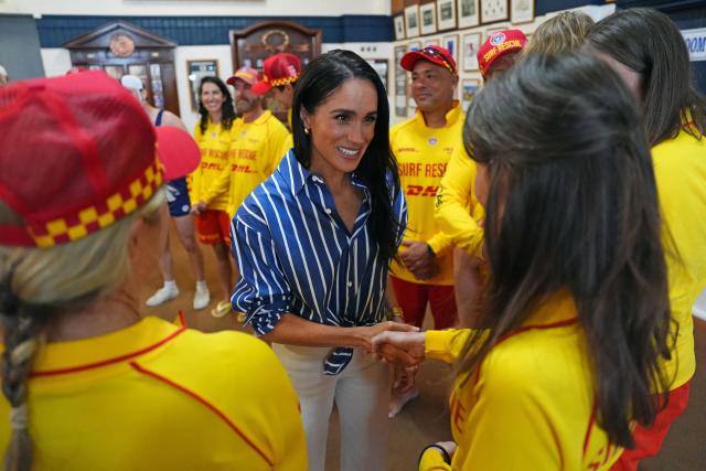 Britain's Meghan, the Duchess of Sussex, meets volunteer first responders from Bondi Surf Bathers' Life Saving Club at Bondi Beach in Sydney on April 17, 2026. (Photo by Jonathan Brady / POOL / AFP)