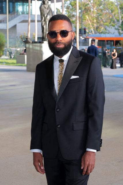 Bahamian artist Tavares Strachan attends the Los Angeles County Museum of Art's (LACMA) opening gala for the David Geffen Galleries at LACMA in Los Angeles, on April 16, 2026. (Photo by Etienne LAURENT / AFP)