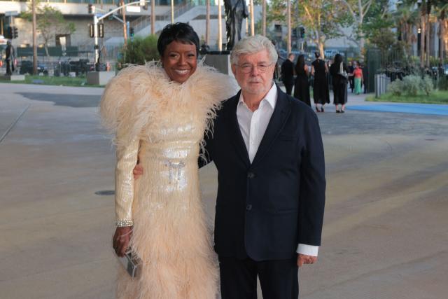 US author Mellody Hobson and husband US filmmaker George Lucas attend the Los Angeles County Museum of Art's (LACMA) opening gala for the David Geffen Galleries at LACMA in Los Angeles, on April 16, 2026. (Photo by Etienne LAURENT / AFP)