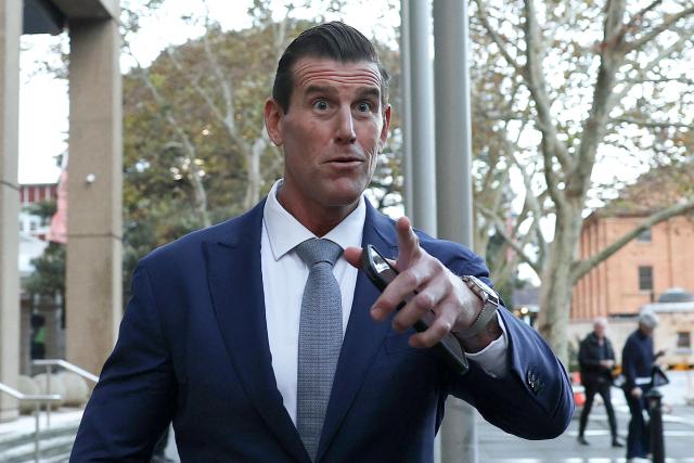 (FILES) A former member of Australia's elite Special Air Service regiment Ben Roberts-Smith leaves the Federal Court in Sydney on May 1, 2025. An Australian court on April 17, 2026 granted bail to former soldier Ben Roberts-Smith, who is charged with murdering unarmed prisoners captured in Afghanistan. (Photo by Saeed KHAN / AFP)
