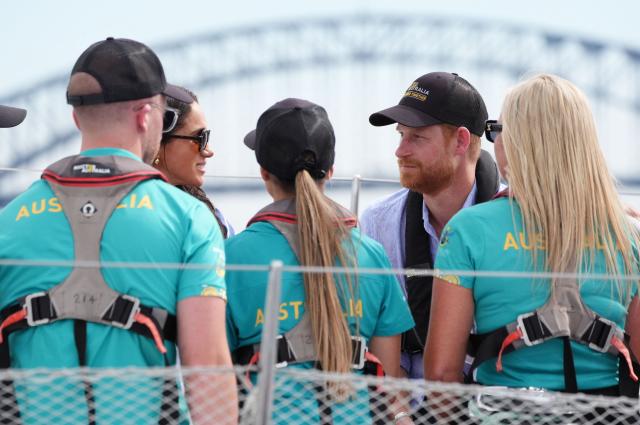 Britain's Prince Harry, Duke of Sussex, and his wife Meghan, the Duchess of Sussex, take part in a sailing event with members of Invictus Australia in Sydney Harbour on April 17, 2026. (Photo by Jonathan Brady / POOL / AFP)