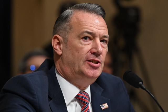 (FILES) Todd Lyons, acting director of US Immigration and Customs Enforcement (ICE), testifies during a House Committee on Homeland Security hearing on Oversight of the Department of Homeland Security on Capitol Hill in Washington, DC, on February 10, 2026. Lyons, will leave his post at the agency charged with enforcing US President Donald Trump's anti-immigrant crackdown in May, the Homeland Security Secretary announced Thursday. (Photo by ANDREW CABALLERO-REYNOLDS / AFP)