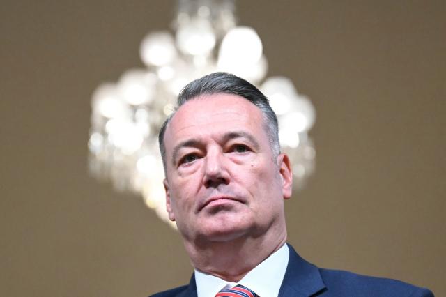 (FILES) Todd Lyons, acting director of US Immigration and Customs Enforcement (ICE), arrives for a House Committee on Homeland Security hearing on Oversight of the Department of Homeland Security on Capitol Hill in Washington, DC, on February 10, 2026. Lyons, will leave his post at the agency charged with enforcing US President Donald Trump's anti-immigrant crackdown in May, the Homeland Security Secretary announced Thursday. (Photo by ANDREW CABALLERO-REYNOLDS / AFP)