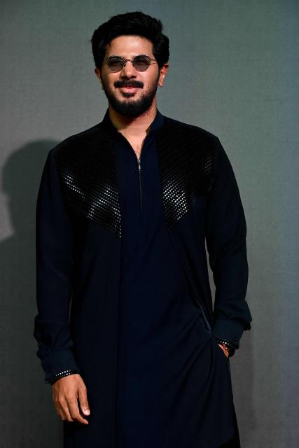 Indian actor Dulquer Salman attends the Indian National Cine Academy Awards in Mumbai on April 16, 2026. (Photo by SUJIT JAISWAL / AFP)