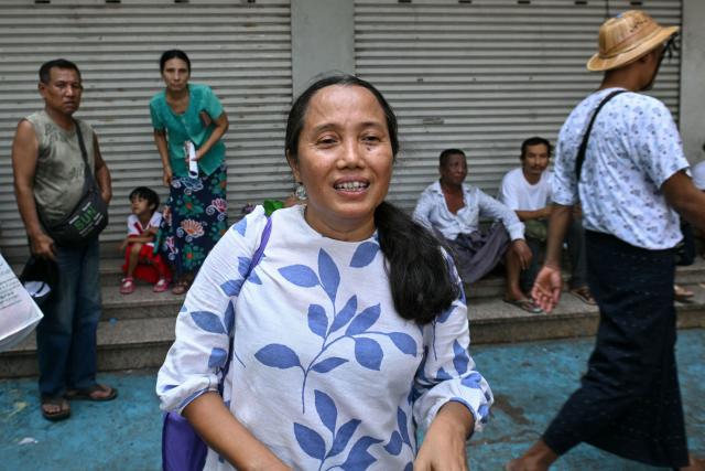 Documentary filmmaker Shin Daewe speaks to journalists after being released from Insein Prison with other prisoners during an amnesty to mark Myanmar's new year in Yangon on April 17, 2026. More than 4,300 prisoners were slated for release on April 17 to mark Myanmar's Thingyan new year, one of the country's many public holidays when forgiveness orders are regularly announced. (Photo by Sai Aung MAIN / AFP)