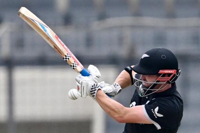 New Zealand’s Henry Nicholls plays a shot during the first one-day international (ODI) cricket match between Bangladesh and New Zealand, at Sher-e-Bangla National Stadium in Mirpur on April 17, 2026. (Photo by MUNIR UZ ZAMAN / AFP)