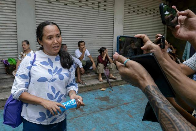 Documentary filmmaker Shin Daewe speaks to journalists after being released from Insein Prison with other prisoners during an amnesty to mark Myanmar's new year in Yangon on April 17, 2026. More than 4,300 prisoners were slated for release on April 17 to mark Myanmar's Thingyan new year, one of the country's many public holidays when forgiveness orders are regularly announced. (Photo by Sai Aung MAIN / AFP)