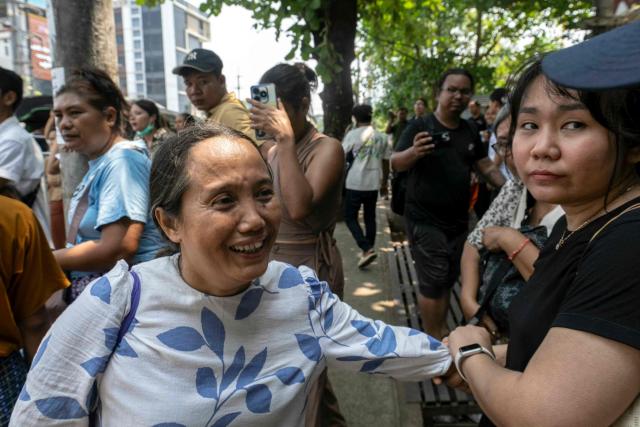 Documentary filmmaker Shin Daewe celebrates after being released from Insein Prison with other prisoners during an amnesty to mark Myanmar's new year in Yangon on April 17, 2026. More than 4,300 prisoners were slated for release on April 17 to mark Myanmar's Thingyan new year, one of the country's many public holidays when forgiveness orders are regularly announced. (Photo by Sai Aung MAIN / AFP)