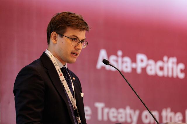 Michael Wislocki, Charge d'Affaires of the Australian Embassy in Jakarta, speaks during a conference with representatives from more than 20 Asia-Pacific countries to discuss the universalisation and implementation of the Treaty on the Prohibition of Nuclear Weapons (TPNW) in Jakarta on April 17, 2026. (Photo by YASUYOSHI CHIBA / AFP)