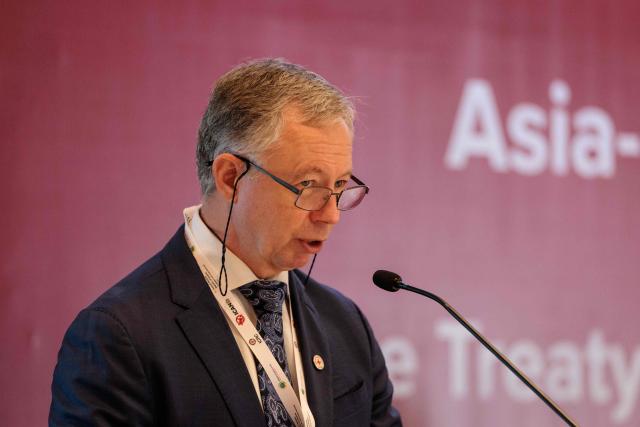 Martin de Boer, Head of the Regional Delegation for Indonesia and Timor-Leste of the International Committee of the Red Cross (ICRC), speaks during a conference with representatives from more than 20 Asia-Pacific countries to discuss the universalisation and implementation of the Treaty on the Prohibition of Nuclear Weapons (TPNW) in Jakarta on April 17, 2026. (Photo by YASUYOSHI CHIBA / AFP)