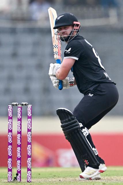 New Zealand’s Henry Nicholls plays a shot during the first one-day international (ODI) cricket match between Bangladesh and New Zealand, at Sher-e-Bangla National Stadium in Mirpur on April 17, 2026. (Photo by MUNIR UZ ZAMAN / AFP)