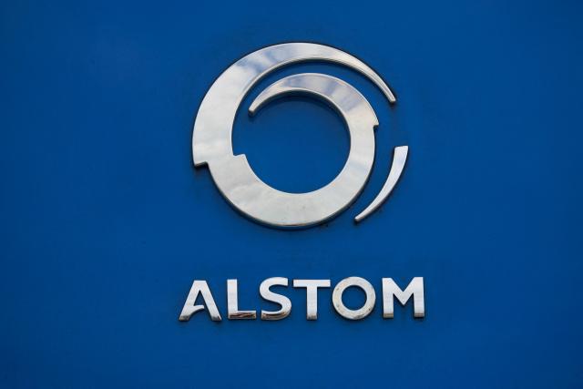 (FILES) A picture taken on February 1, 2023 shows an Alstom logo on Alstom's Coradia ilint Hydrogen train during testing on tracks between Reignac-sur-Indre and Loches, central France. Alstom’s share price plunged nearly 30% on April 17, 2026 less than half an hour after the opening of a session on the Paris Stock Exchange, following a downward revision of its financial performance targets due to delivery delays. (Photo by GUILLAUME SOUVANT / AFP)