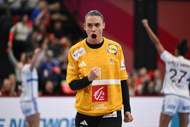 (FILES) France's goalkeeper #01 Laura Glauser reacts after stopping a shot during the women's EHF 2024 European championship handball game between France and Spain at the St Jakobshalle in Basel on November 30, 2024. (Photo by Fabrice COFFRINI / AFP)