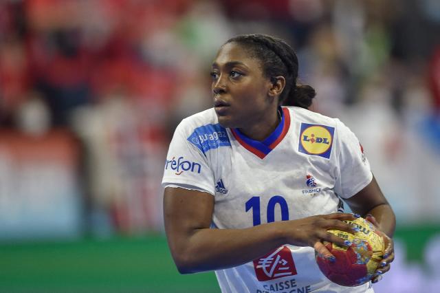 (FILES) France's centre back Grace Zaadi Deuna holds the ball during the final handball match between France and Norway of the IHF World Women's Handball Championship at the Palau d'Esports in Granollers on December 19, 2021. (Photo by Pau BARRENA / AFP)