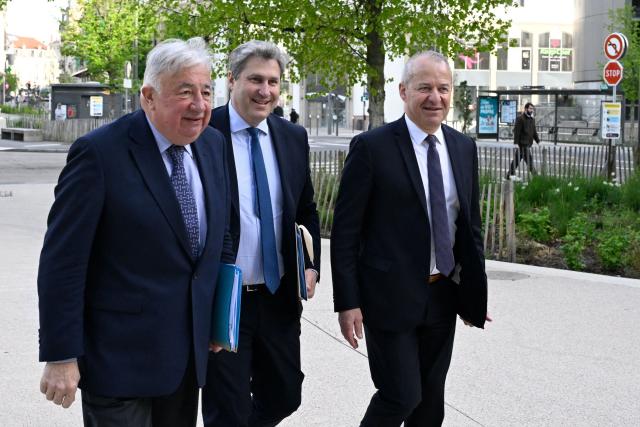 (LtoR) Senate President Gerard Larcher, Les Republicains (LR) Senate group president Mathieu Darnaud and Meurthe-et-Moselle Senator Jean-Francois Husson arrive ahead of the LR senators' seminar at the Prouvé Convention Center in Nancy, northeastern France, on April 17, 2026. (Photo by Jean-Christophe VERHAEGEN / AFP)