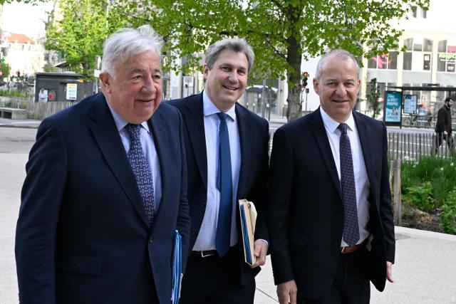(LtoR) Senate President Gerard Larcher, Les Republicains (LR) Senate group president Mathieu Darnaud and Meurthe-et-Moselle Senator Jean-Francois Husson arrive ahead of the LR senators' seminar at the Prouvé Convention Center in Nancy, northeastern France, on April 17, 2026. (Photo by Jean-Christophe VERHAEGEN / AFP)