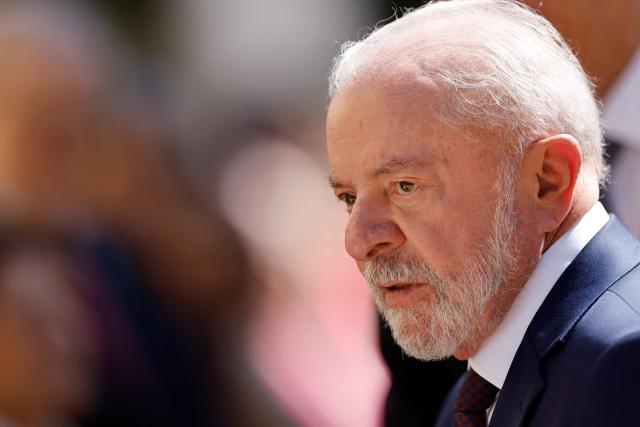Brazilian President Luiz Inacio Lula da Silva looks on during a military ceremony held to welcome the Brazilian President at the Palacio de Pedralbes in Barcelona on April 17, 2026. Lula meets Spanish Prime Minister Pedro Sanchez and is to attend a forum of progressive leaders on April 18. Other attendees at the gathering in Barcelona include Mexican President and South African President. (Photo by Oscar DEL POZO / AFP)