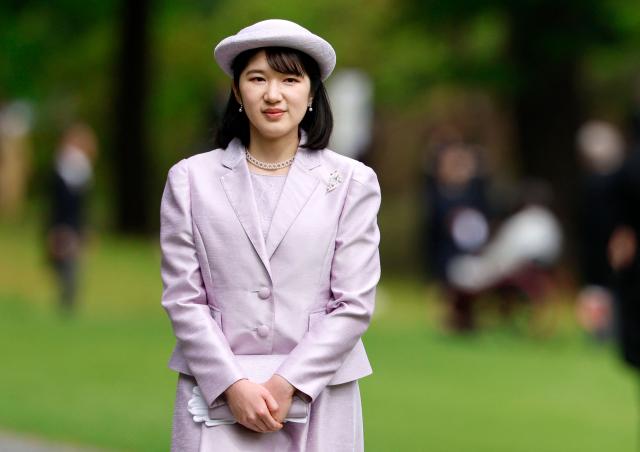 Japan's Princess Aiko, daughter of Emperor Naruhito and Empress Masako, attends the spring imperial garden party at the Akasaka Palace's imperial garden in Tokyo on April 17, 2026. (Photo by Franck ROBICHON / POOL / AFP)