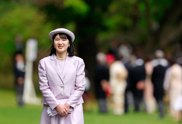 Japan's Princess Aiko, daughter of Emperor Naruhito and Empress Masako, attends the spring imperial garden party at the Akasaka Palace's imperial garden in Tokyo on April 17, 2026. (Photo by Franck ROBICHON / POOL / AFP)