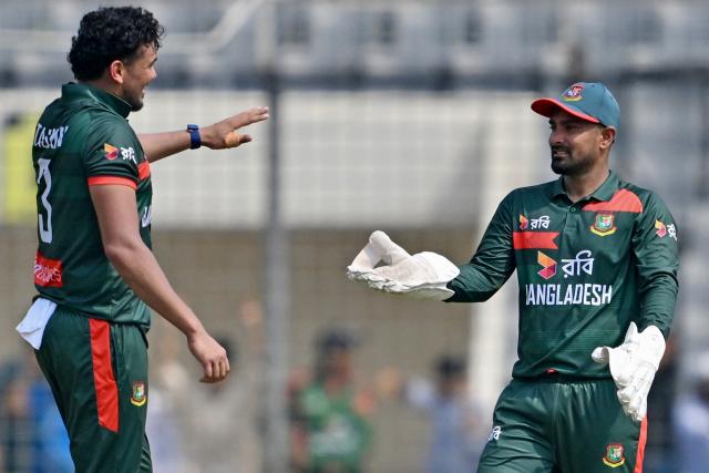 Bangladesh’s Taskin Ahmed and Litton Das celebrate after the dismissal of New Zealand’s Josh Clarkson during the first one-day international (ODI) cricket match between Bangladesh and New Zealand, at Sher-e-Bangla National Stadium in Mirpur on April 17, 2026. (Photo by MUNIR UZ ZAMAN / AFP)