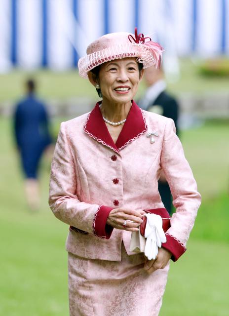 Japan's Princess Takamado smiles during the spring imperial garden party at the Akasaka Palace's imperial garden in Tokyo on April 17, 2026. (Photo by Franck ROBICHON / POOL / AFP)