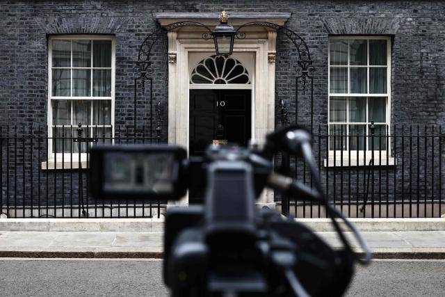 The door to 10 Downing Street, the official residence of Britain's sitting Prime Minister, is pictured in Westminster in central London on April 17, 2026. UK Prime Minister Keir Starmer faced mounting pressure to quit on April l7, over his appointment of Peter Mandelson as envoy to Washington, after it emerged the veteran politician had failed security vetting. (Photo by Henry NICHOLLS / AFP)