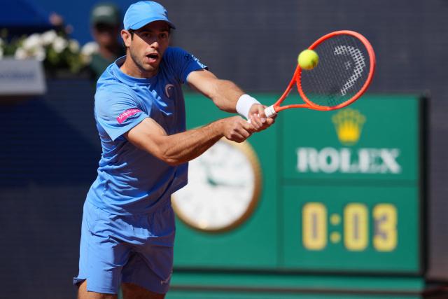 Portugal's Nuno Borges hits a return against Serbia's Hamad Medjedovic during the ATP Barcelona Open "Conde de Godo" tennis tournament tennis match at the Real Club de Tenis in Barcelona, on April 17, 2026. (Photo by Manaure QUINTERO / AFP)